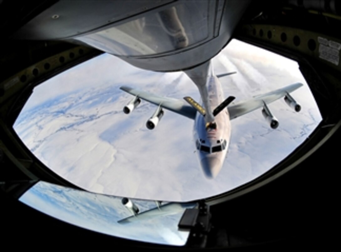 An aircraft holds steady while refueling from a KC-135 Extender from the 168th Air Refueling Wing over Eielson Air Force Base, Alaska, on March 22, 2009.  