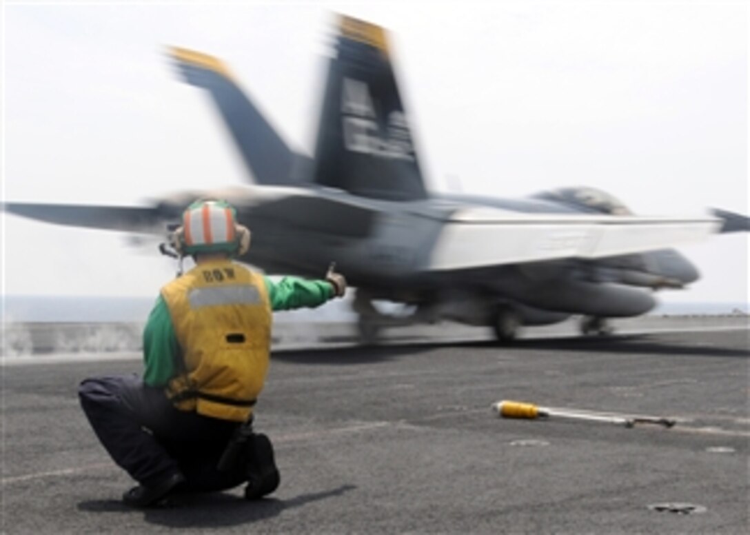 A U.S. Navy F/A-18F Super Hornet aircraft from Strike Fighter Squadron 103 launches from the flight deck of the aircraft carrier USS Dwight D. Eisenhower (CVN 69) in the Arabian Sea on March 31, 2009.  The Eisenhower Carrier Strike Group is underway for a deployment in support of the on-going rotation of forward-deployed forces supporting maritime security operations.  