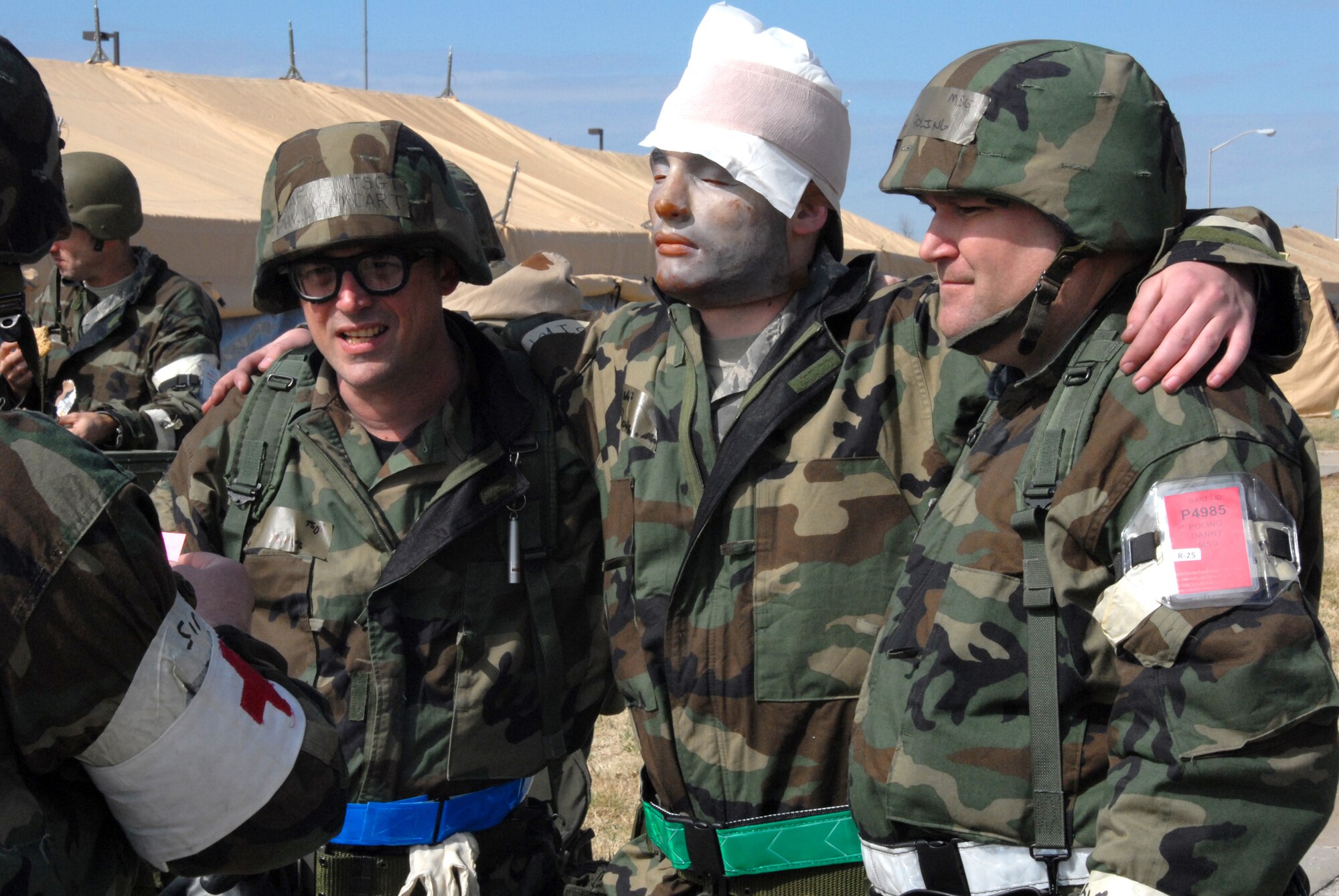 Airman 1st Class Matthew Bounds of the 442nd Aircraft Maintenance Squadron, along with Tech. Sgt. Phil McCart and Master Sgt. Danny Poling Jr. of the 442nd Mission Support Flight, arrive at the Medical Squadron tent with simulated injuries. The 442nd MDS is part of the 442nd Fighter Wing, an Air Force Reserve Command A-10 Thunderbolt II unit based at Whiteman Air Force Base, Mo. (US Air Force photo/Senior Airman Dani Wolf) 
