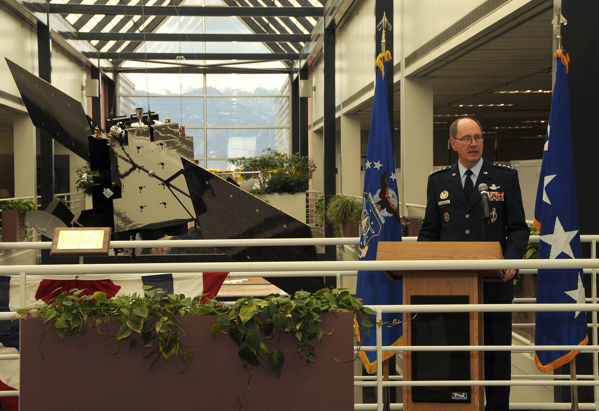 Gen. C. Robert Kehler, commander of Air Force Space Command, addresses attendees at a special ceremony at Peterson Air Force Base, Colo., where he accepted a one-quarter scale model of the new Advanced Extremely High Frequency satellite from Lockheed Martin representatives. The first AEHF satellite is scheduled to be launched the last quarter of 2010. (U.S. Air Force photo/Tech. Sgt. Matt Lohr) 
