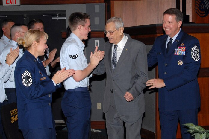 Chief Master Sgt. of the Air Force Paul W. Airey greets Airman 1st Class Matthew Shaffer and Chief Master Sgt. Pamela Derrow following a presentation in 2008. Escorting Chief Airey is current Chief Master Sgt. of the Air Force Rodney J. McKinley. Chief Airey passed away March 11. Chief Airey was the first chief master sergeant of the Air Force, Chief Derrow is the U.S. Air Forces in Europe command chief. (Courtesy photo) 