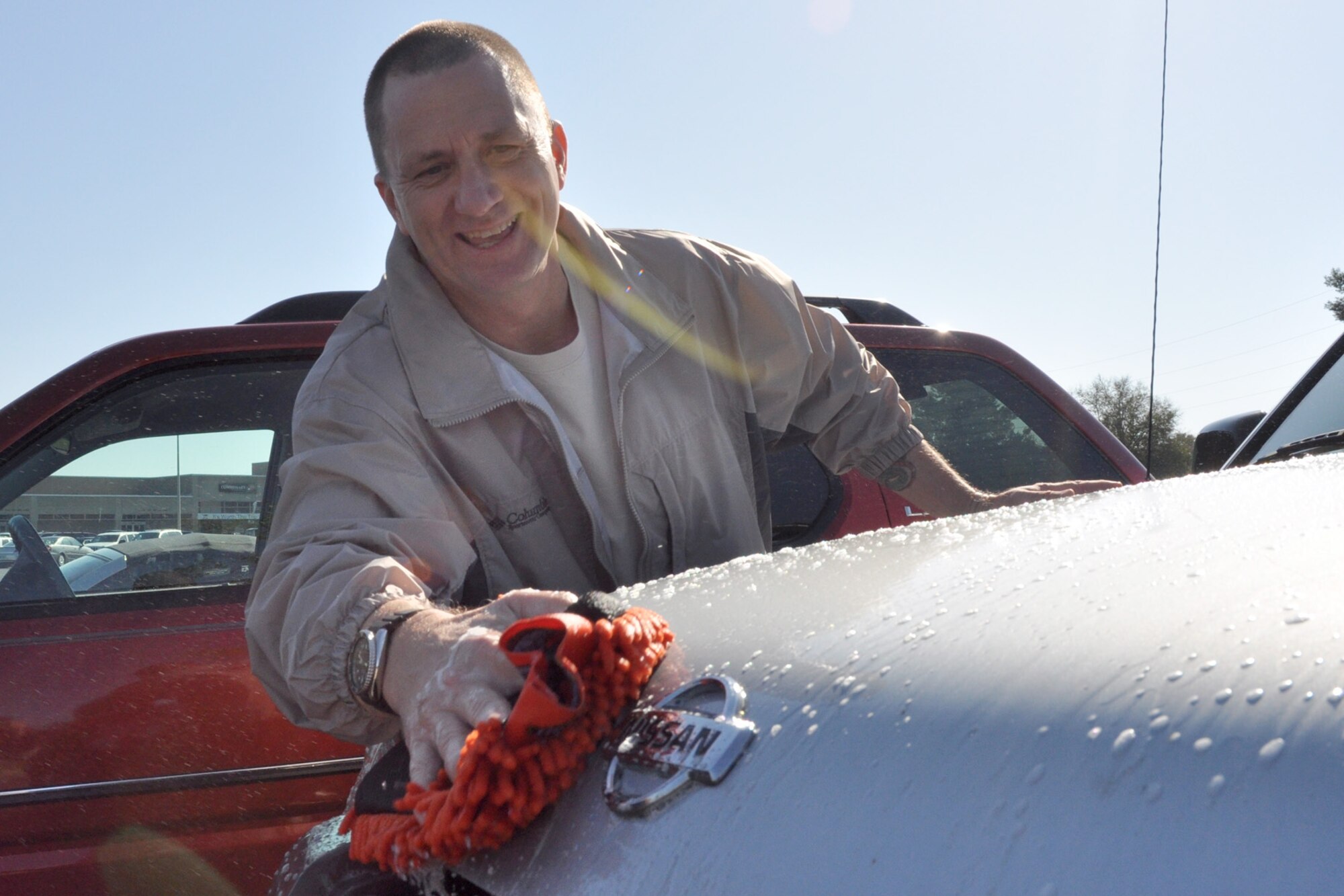 EGLIN AIR FORCE BASE, Fla. -- Master Sgt. Jeff Bridgman, 96th Communication Group, joins other Team Eglin First Sergeants in a car wash to raise funds for the Air Force Assistance Fund today in front of the base commissary. AFAF was established to provide for an annual effort to raise funds for the charitable affiliates that
provide support to the Air Force family (active duty, retirees, reservists,
guard and their dependents, including surviving spouses) in need. (U.S. Air Force photo/ Chrissy Cuttita)
