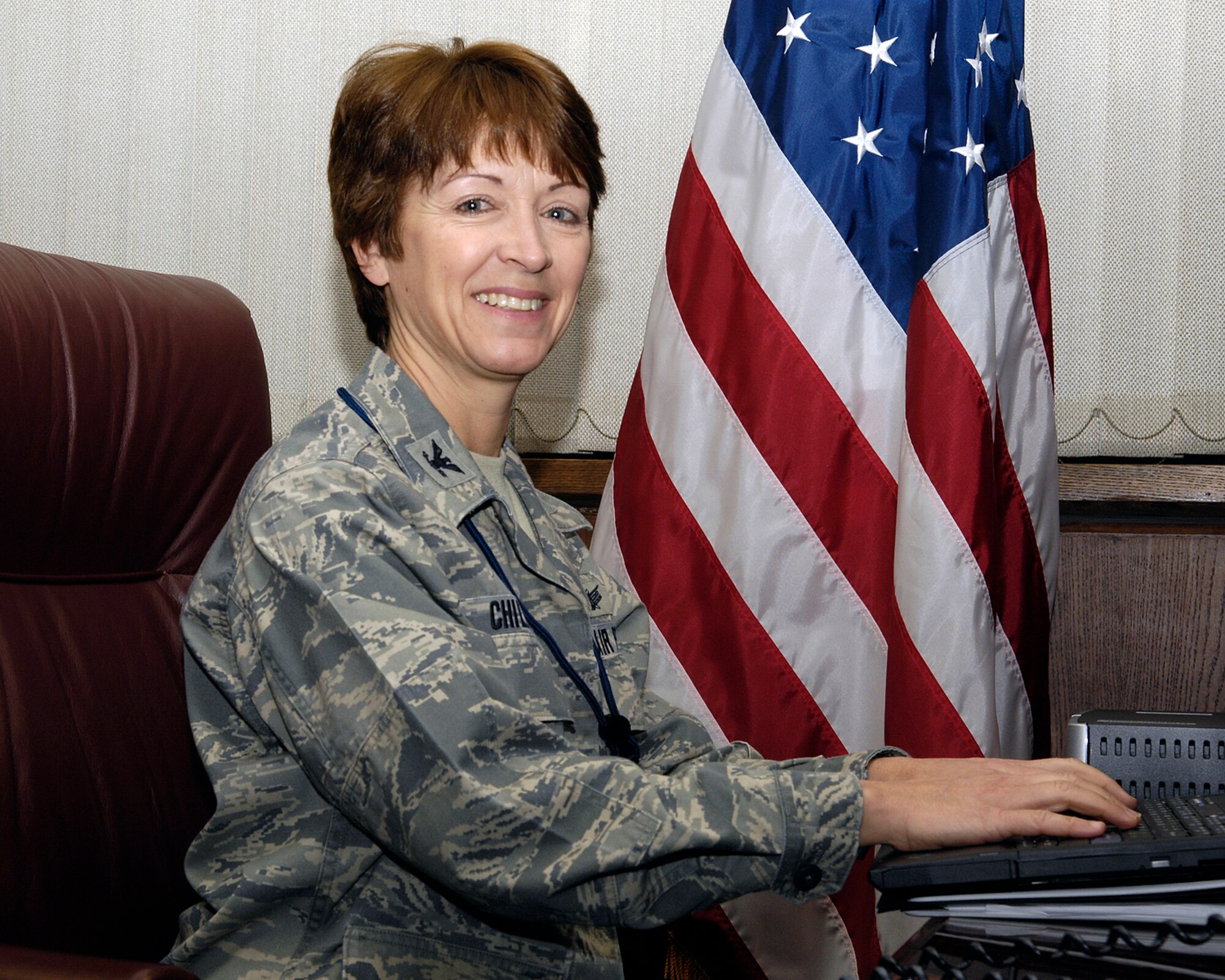 Brig. Gen. (sel.) Catherine Chilton works in her office while on reserve duty at Hanscom last month.  The mobilization assistant to Electronic Systems Center Commander Lt. Gen. Ted Bowlds said she intends to work toward meeting ESC’s goals while also better integrating the roles of the center’s reserve force.  (Photo by Linda LaBonte-Britt)
