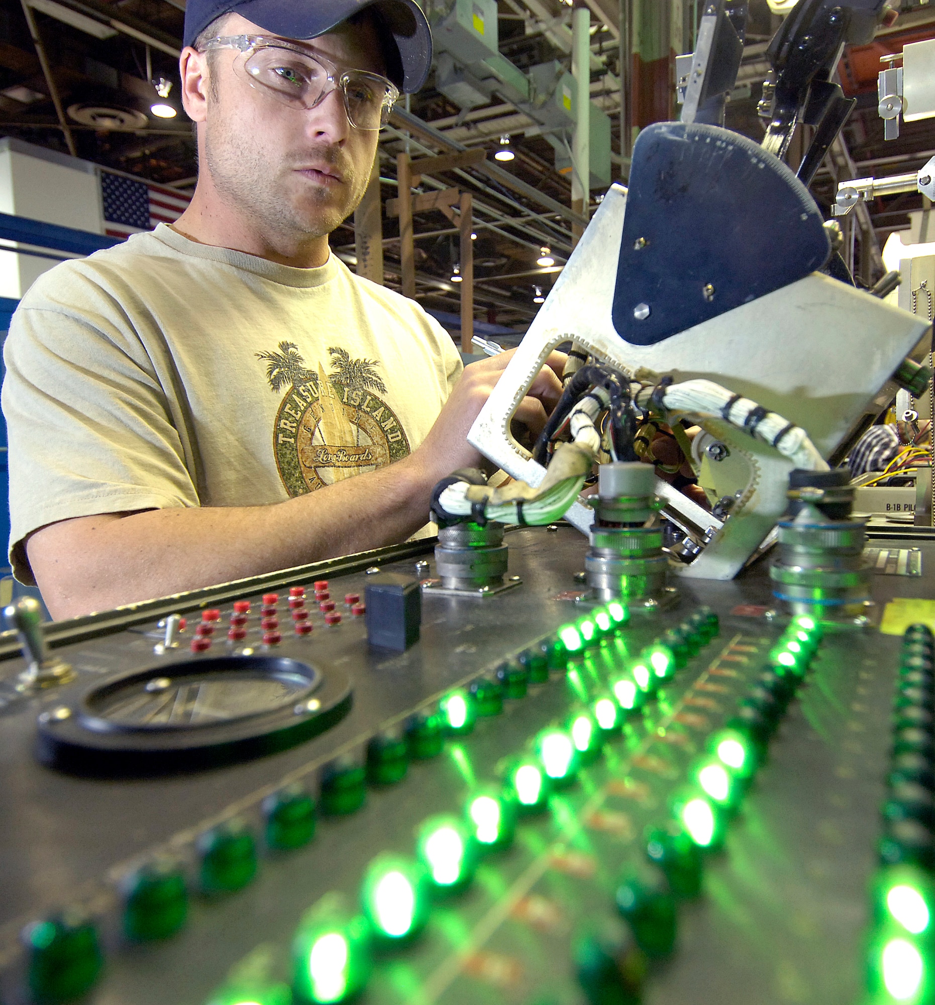 Searching for problems, Clint Cox tests an A-10’s thrust control quadrant, the component that gives the engine its thrust. Using a probe and checking his progress by indicators, he identifies areas that need repair or replacement. (Air Force photo/Margo Wright)
