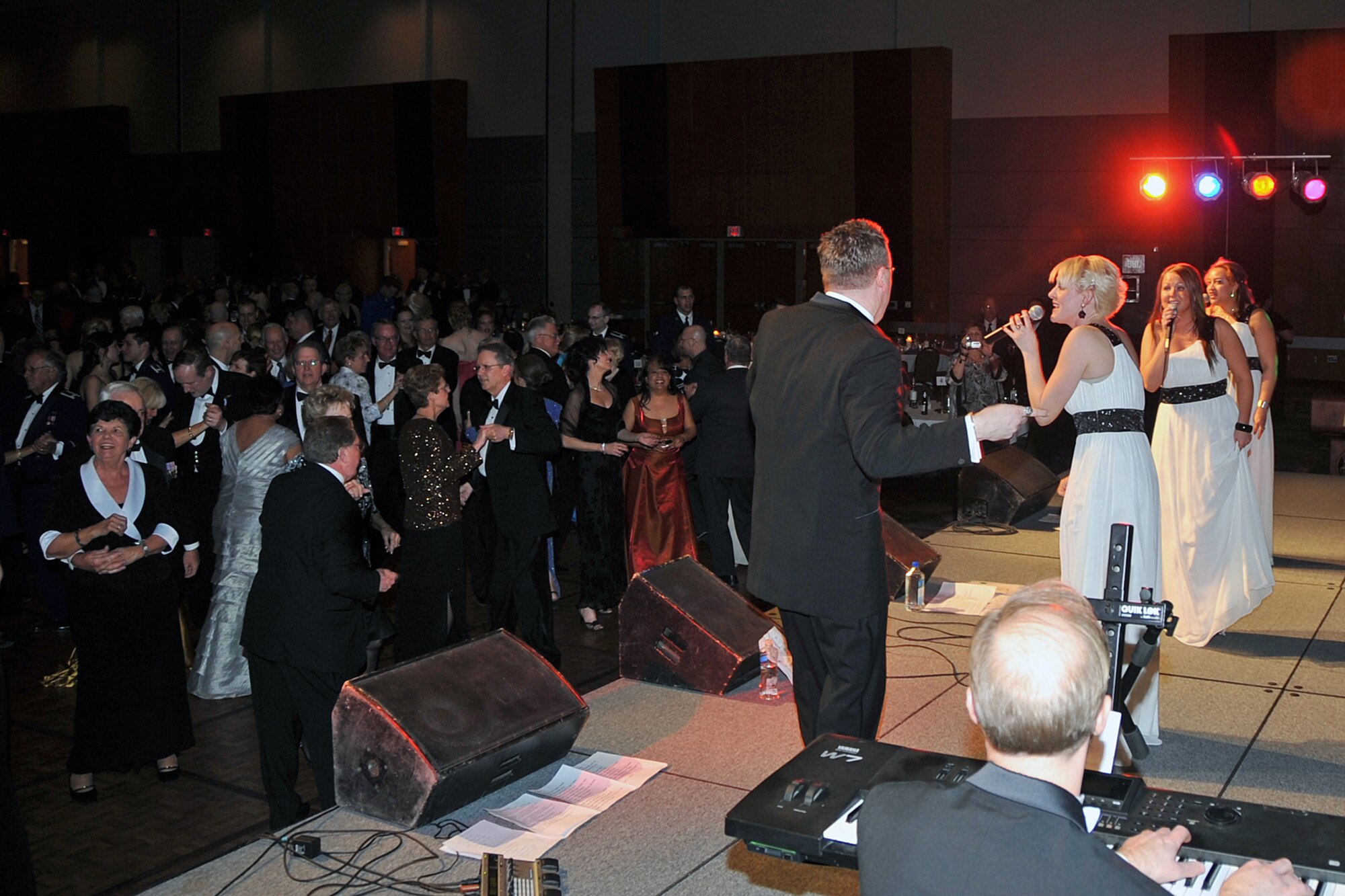 OFFUTT AIR FORCE BASE, Neb. -- Patrons dance to the music  of the Doc James Band featuring Honey as part of the festivities at the 2009 Birthday Ball held at the Qwest Center March 28. 

Air Force Photo by Jeff Gates