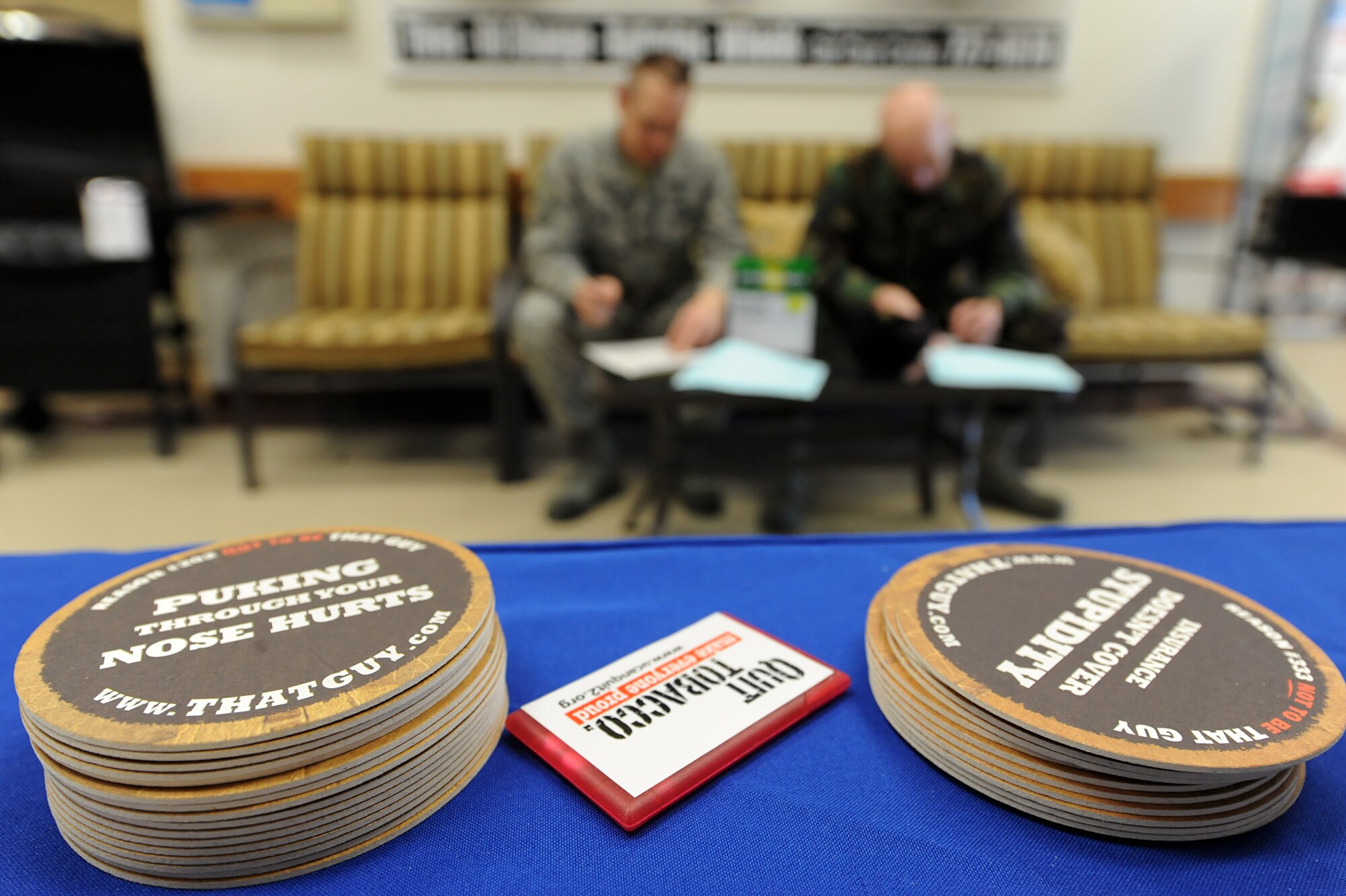 MINOT AIR FORCE BASE, N.D. – Airmen from Minot Air Force Base take a moment to fill out an anonymous alcohol screening test as part of National Alcohol Screening Day at the base exchange here April 2.  By completing this alcohol self-assessment, Airmen can potentially prevent unhealthy drinking habits before they start.  (U.S. Air Force photo by Senior Airman Kelly Timney)