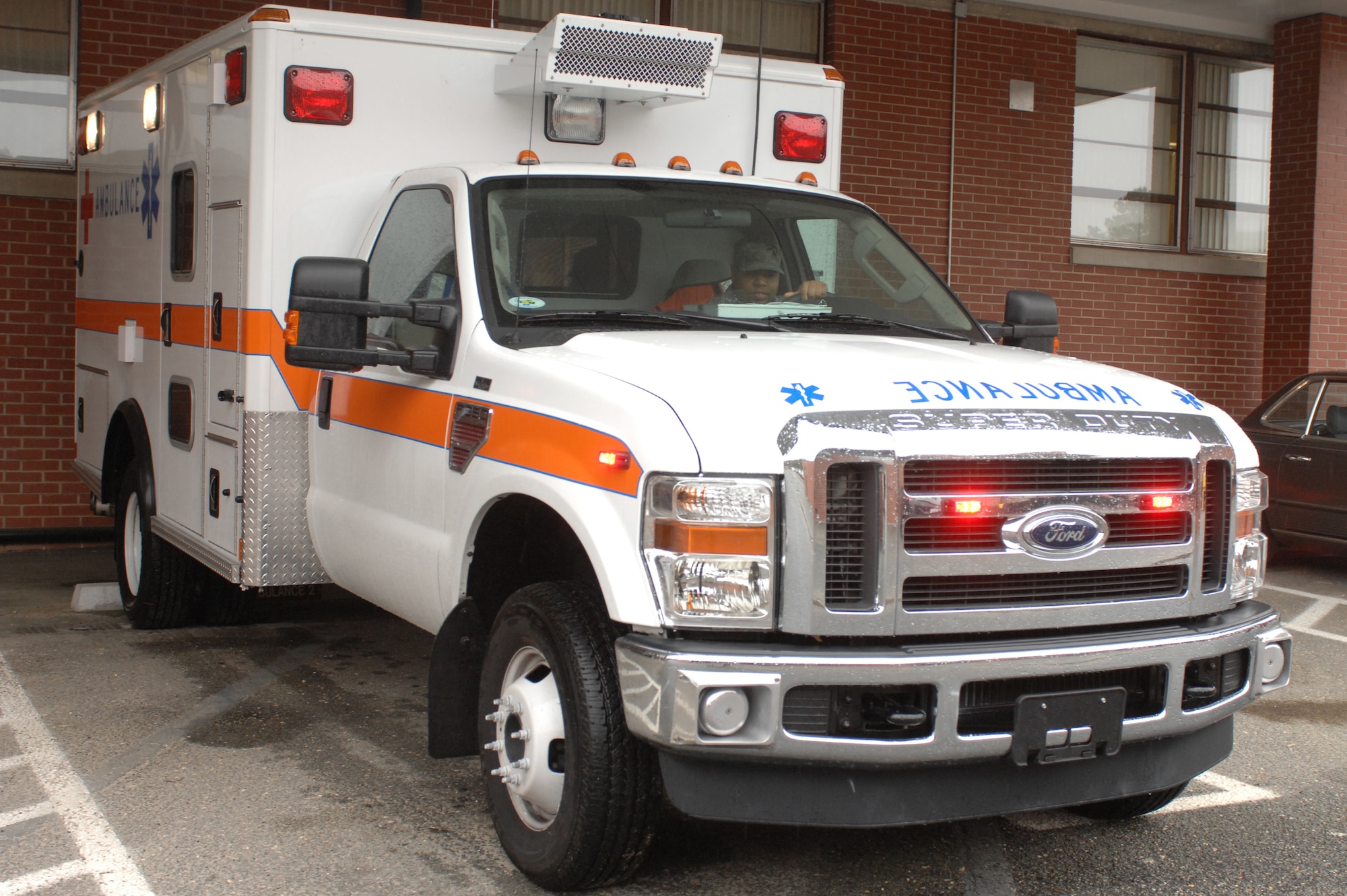 Technical Sgt. Paul Patterson, 4th Medical Group, returns the ambulance to the clinic after responding to an emergency on the flightline at Seymour Johnson Air Force Base, N.C., April 2, 2009. The ambulance service only operates to the flighline after the medical group formed a contract with Wayne County Emergency Medical Service in 2008, making them the official emergency medical responders for the base. (U.S. Air Force photo by Airman 1st Class Whitney S. Lambert) 
