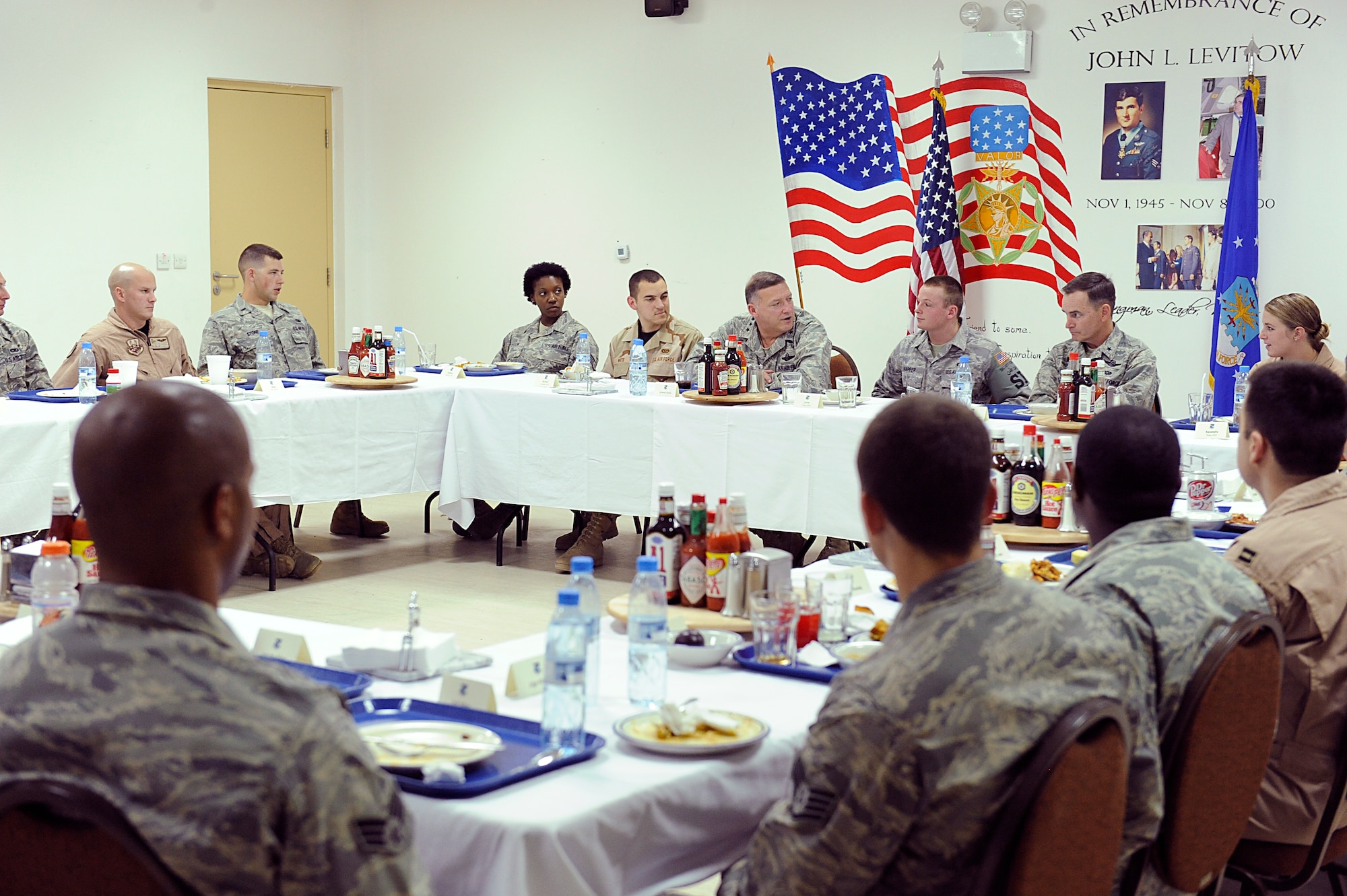 SOUTHWEST ASIA - Lt. Gen. Gary North, U.S. Air Forces Central, commander talks to Airmen and Soldiers during a luncheon at the 380th Air Expeditionary Wing, April 1. General North spoke to them on the importance of what each individual does and the value everyone brings to the fight. The Airman and Soldiers were able to ask questions and hear where certain aspects of the Air Force are headed. (U.S. Air Force photo by Senior Airman Brian J. Ellis) (Released)