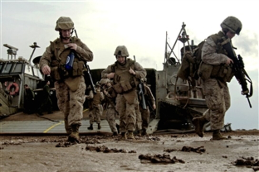 U.S. Marines participate in an amphibious landing exercise on Camp Lemonier, Djibouti, April 1, 2009. The Marines are assigned to the 13th Marine Expeditionary Unit. The unit established a beachhead after coming ashore on landing craft launched from the USS Boxer.