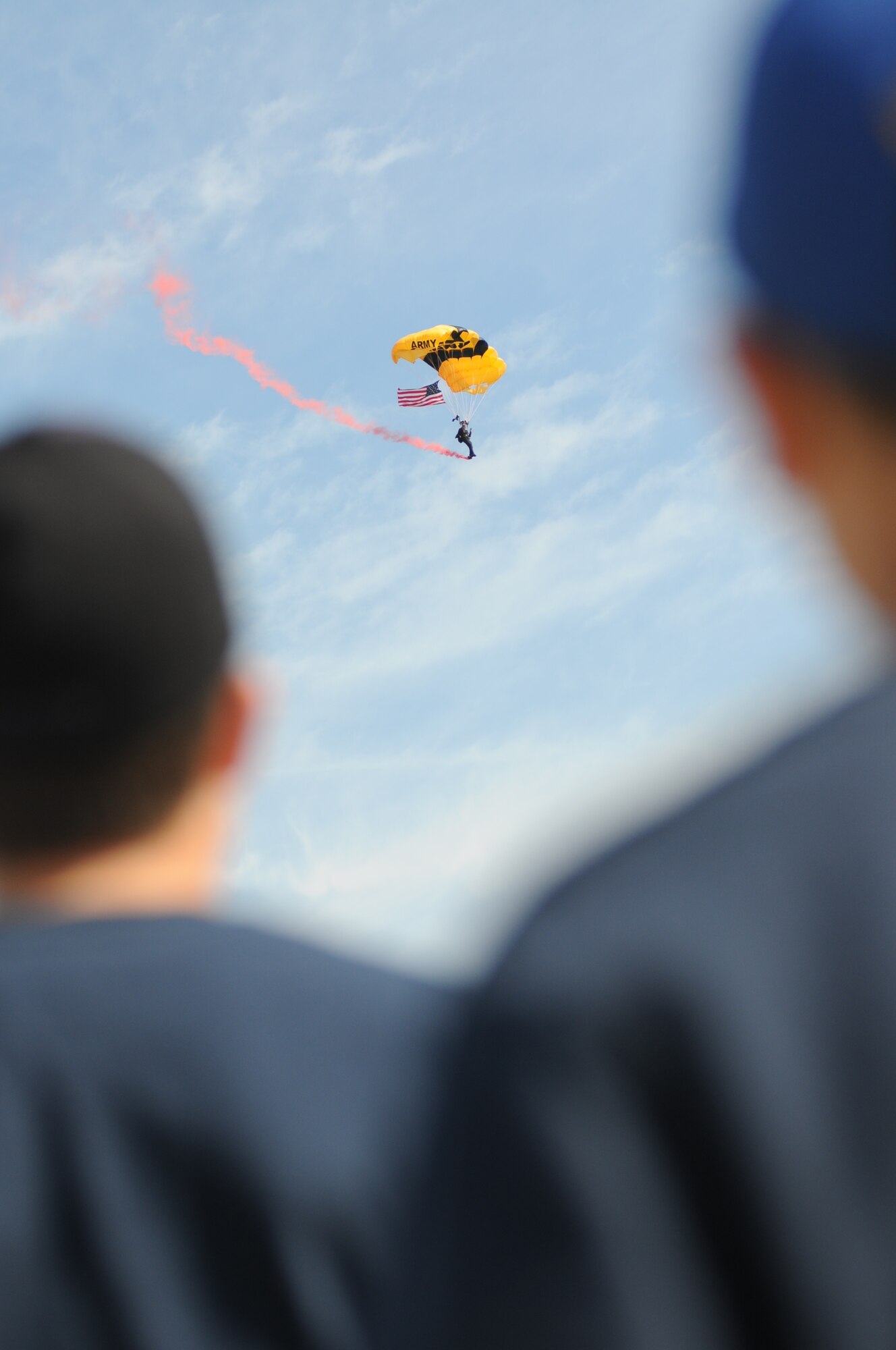 One of the Army’s Golden Knights parachutes over the air field at the opening ceremonies for Keesler’s Thunder on the Bay Air Show April 4.  (U.S. Air Force photo by Kemberly Groue)