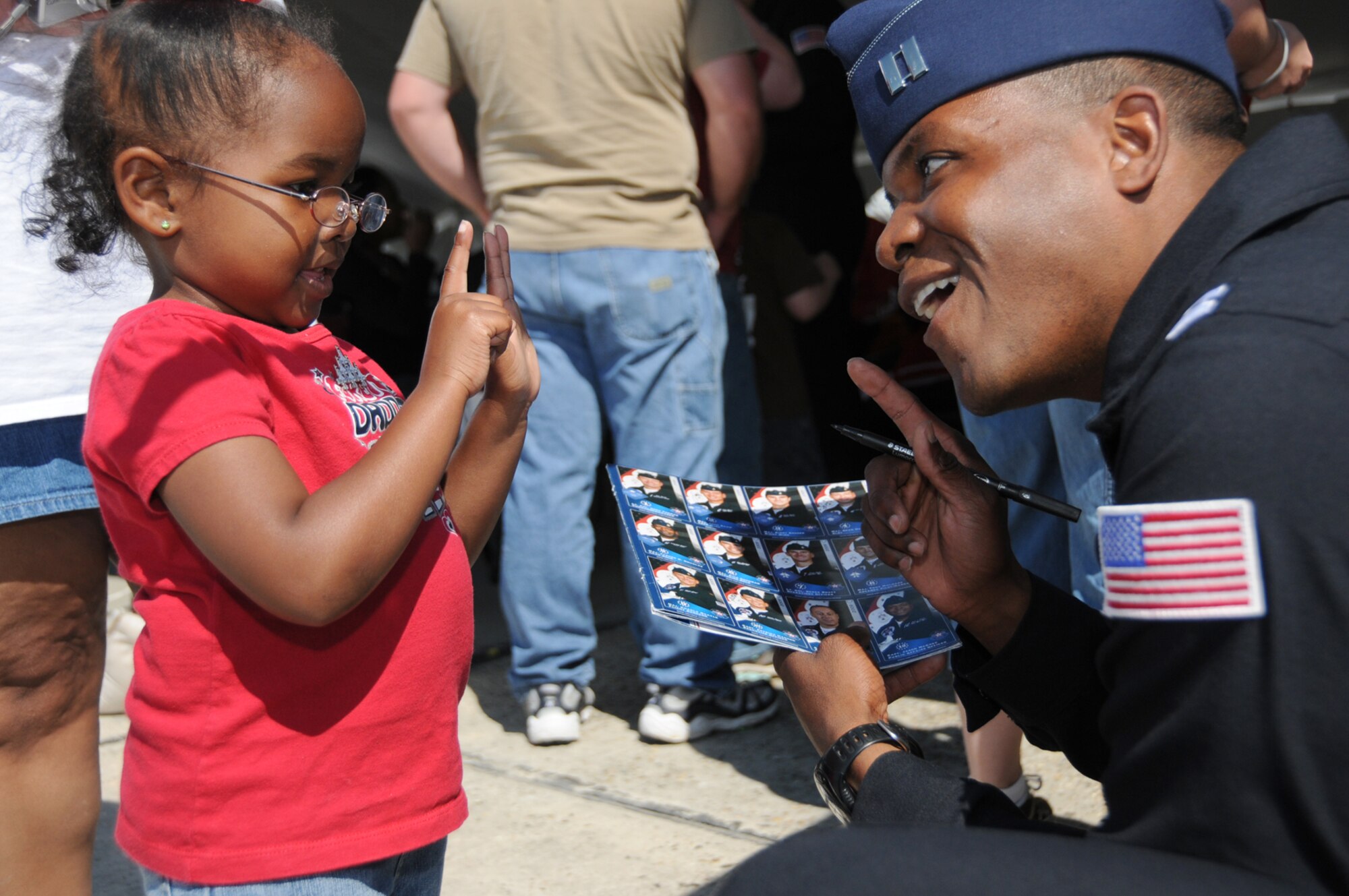 Members of the Air Force Thunderbirds demonstration team visit with Make a Wish Foundation visitors who watched the practice sessions March 3 in advance of the Thunder on the Bay Air Show March 4-5.  The Thunderbirds are making their first air show appearance at Keesler since 1995.  It’s Keesler’s first air show in five years.  (U.S. Air Force photo by Kemberly Groue)

