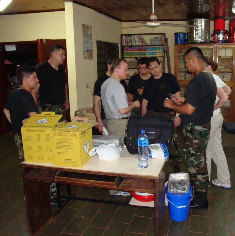 104th Medical Group members prepare equipment prior to starting any exams. 