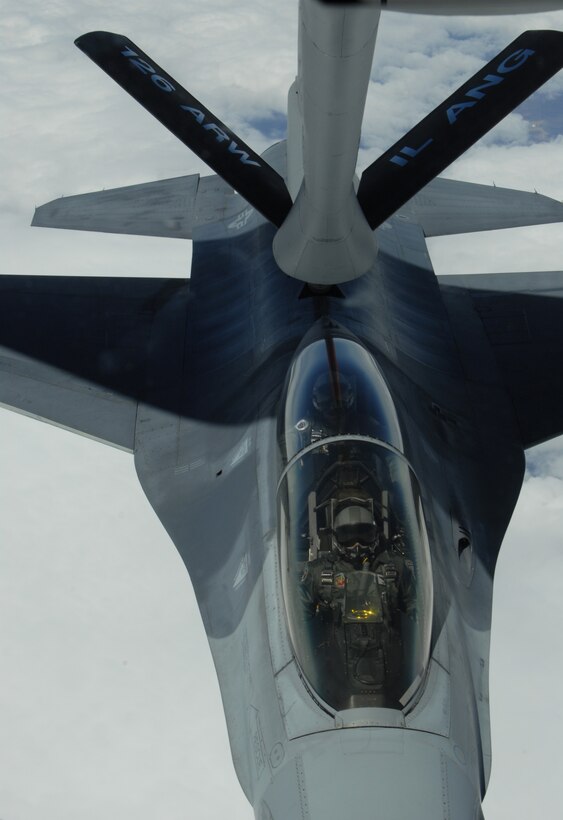 F-16 Fighter jets assigned to the 122nd Fighter Wing, Fort Wayne, Indiana and the 127th Fighter Wing, Selfridge, Michigan, make a quick stop for a routine refueling from a KC-135R Stratotanker assigned to the 126th Air Refueling Wing, Scott Air Force Base, Ill., before returning to their mission.