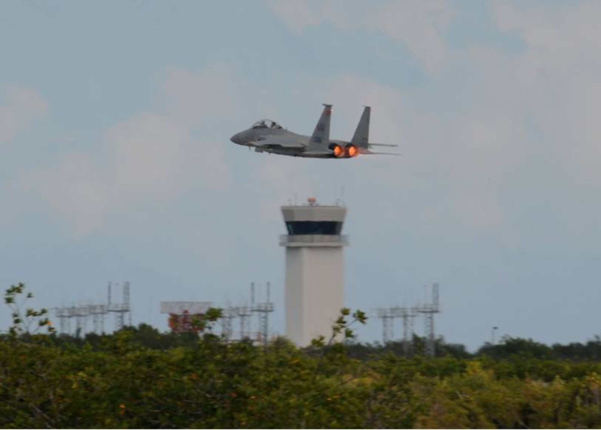 An F-15 D Eagle races by the tower at NAS Key West 