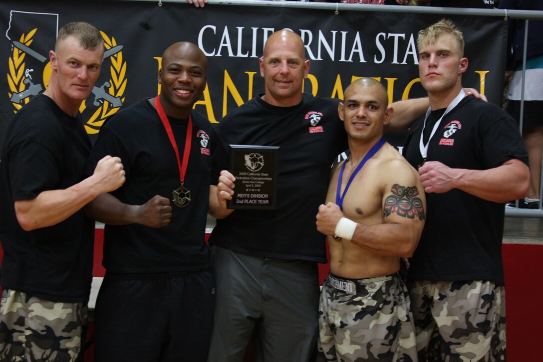 Heavyweight Fight Club 29 member Nate Wolf defeats his opponent Billy Cotton in his final bout during the California State Pankration Championships in Santa Ana, Calif., Sunday.