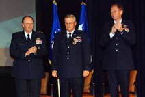 ATLANTA -- Maj. Gen. Martin M. Mazick, center, recieves applause April 4 at the 22nd Air Force Senior Leaders Conference 2009 after being awarded the Distinguished Service Medal for his meritorious service as commander, 22nd Air Force, from 2006 to 2009. After General Mazick was awarded the medal by Lt. Gen. Charles E. Stenner Jr., commander, Air Force Reserve Command, left, Maj. Gen. James T. Rubeor, right, assumed command of 22nd Air Force, coming from his position as deputy to the chief of Air Force Reserve, Headquarters U.S. Air Force Reserve, Washington D.C. (U.S. Air Force photo/2nd Lt. Joe Simms)