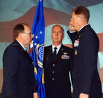 ATLANTA -- Maj. Gen. James T. Rubeor assumes command of the 22nd Air Force from Lt. Gen. Charles E. Stenner Jr., commander, Air Force Reserve Command, during the 22nd Air Force Senior Leaders Conference 2009 April 4 here. General Rubeor comes from his position as the deputy to the chief, Air Force Reserve Command, Washington D.C. 22nd AF Command Chief Master Sergeant James R. Fields Jr., center, looks on. (U.S. Air Force photo/2nd Lt. Joe Simms)