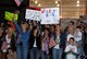 Friends and family cheer, wave flags and welcome home signs as guardsmen from the 111th Fighter Wing, Pa. Air National Guard, return to Willow Grove ARS, Pa. Sept. 20 from a deployment to Afghanistan.