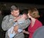 Staff Sgt. Norman E. Bauer Jr., 111th Maintenance Sq., is met by wife Bethany and son Matthew upon returning to Willow Grove ARS, Pa. from a deployment to Afghanistan on Sept. 20.