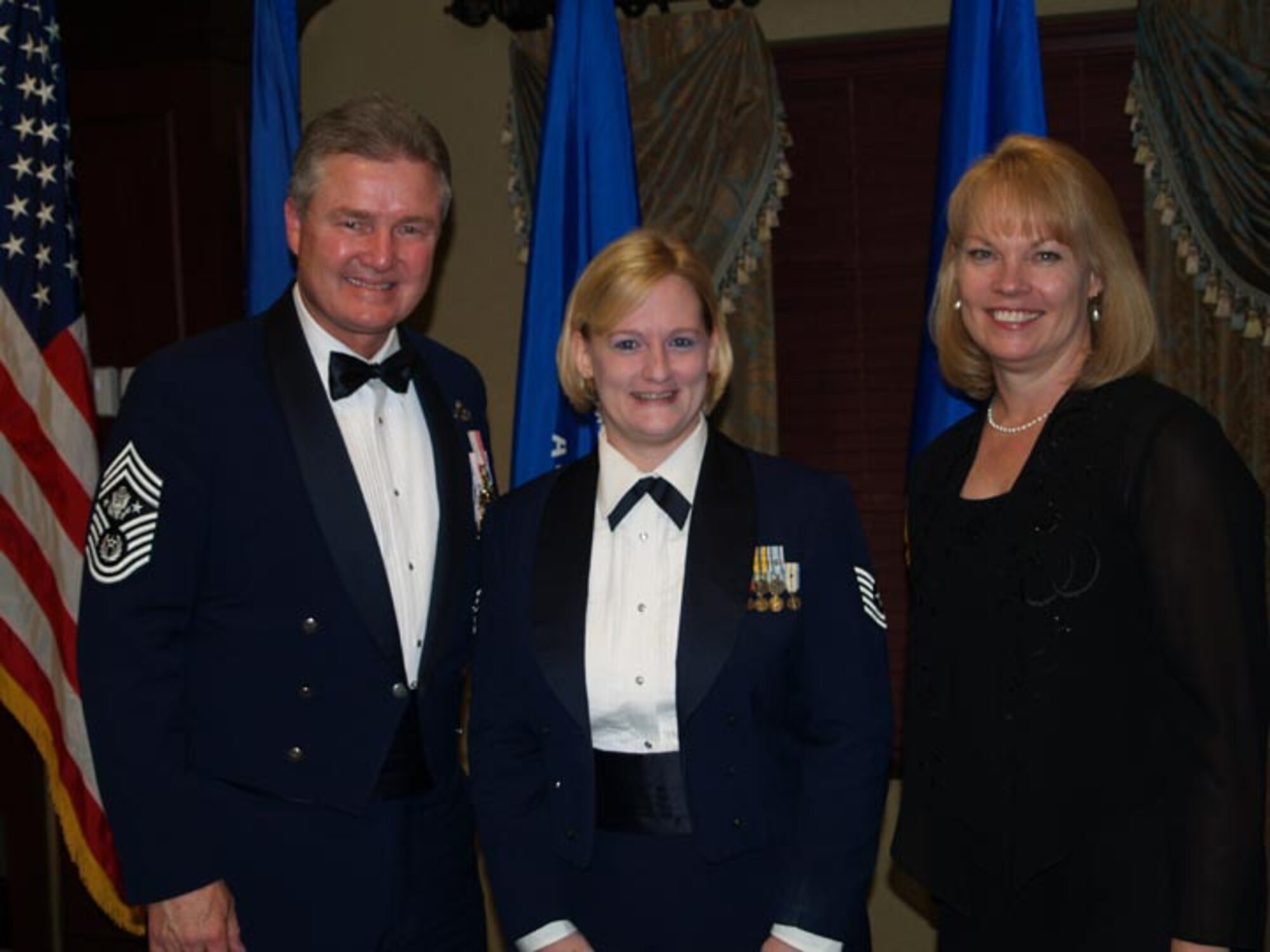 SEYMOUR JOHNSON AIR FORCE BASE, N.C. -- Tech. Sgt. Kim Browne (center), a Reservist with the 916th Mission Support Flight, poses with Chief Master Sergeant of the Air Force Gerald Murray (left) during the 29th annual Air Force Sergeant Association's Annual Division Convention in March.