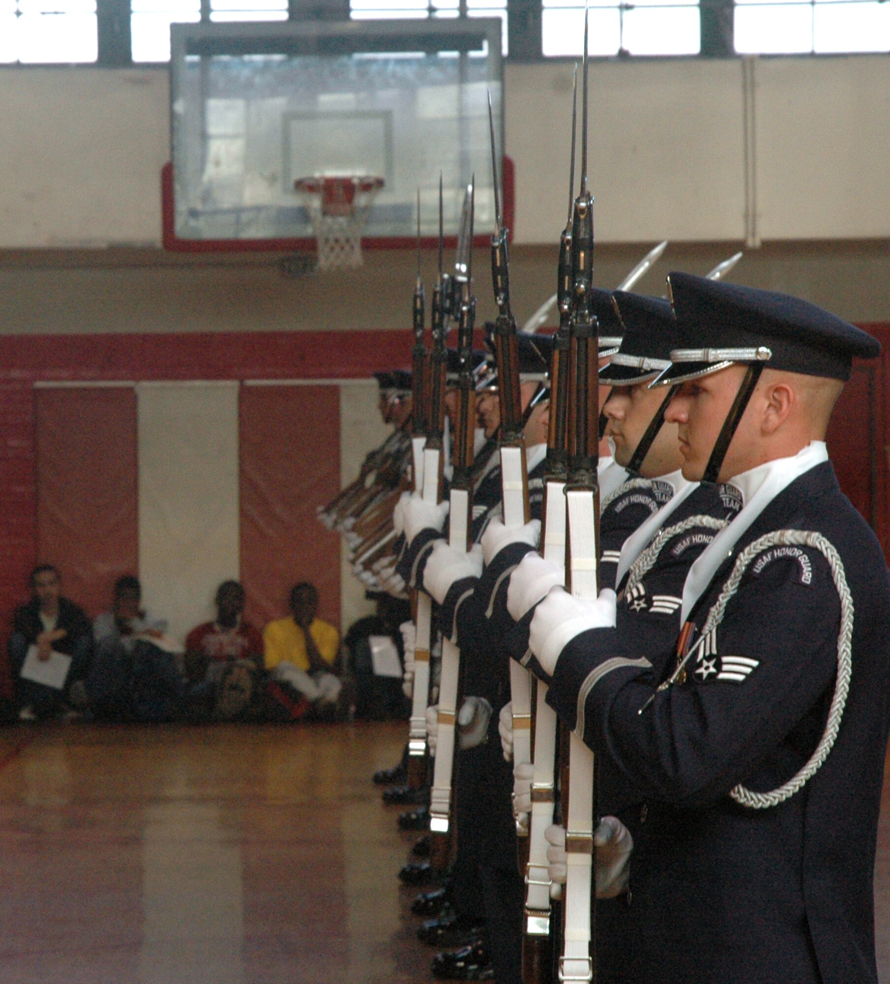 The U.S. Air Force Honor Guard Drill Team performs April 1 at Robert E. Lee High School. The U.S. Air Force Honor Guard Drill Team and the U.S. Air Force Band Max Impact joined forces for the first time to showcase their skills in two joint performances in the Southeast region. (U.S. Air Force photo by Senior Airman R. Michael Longoria)