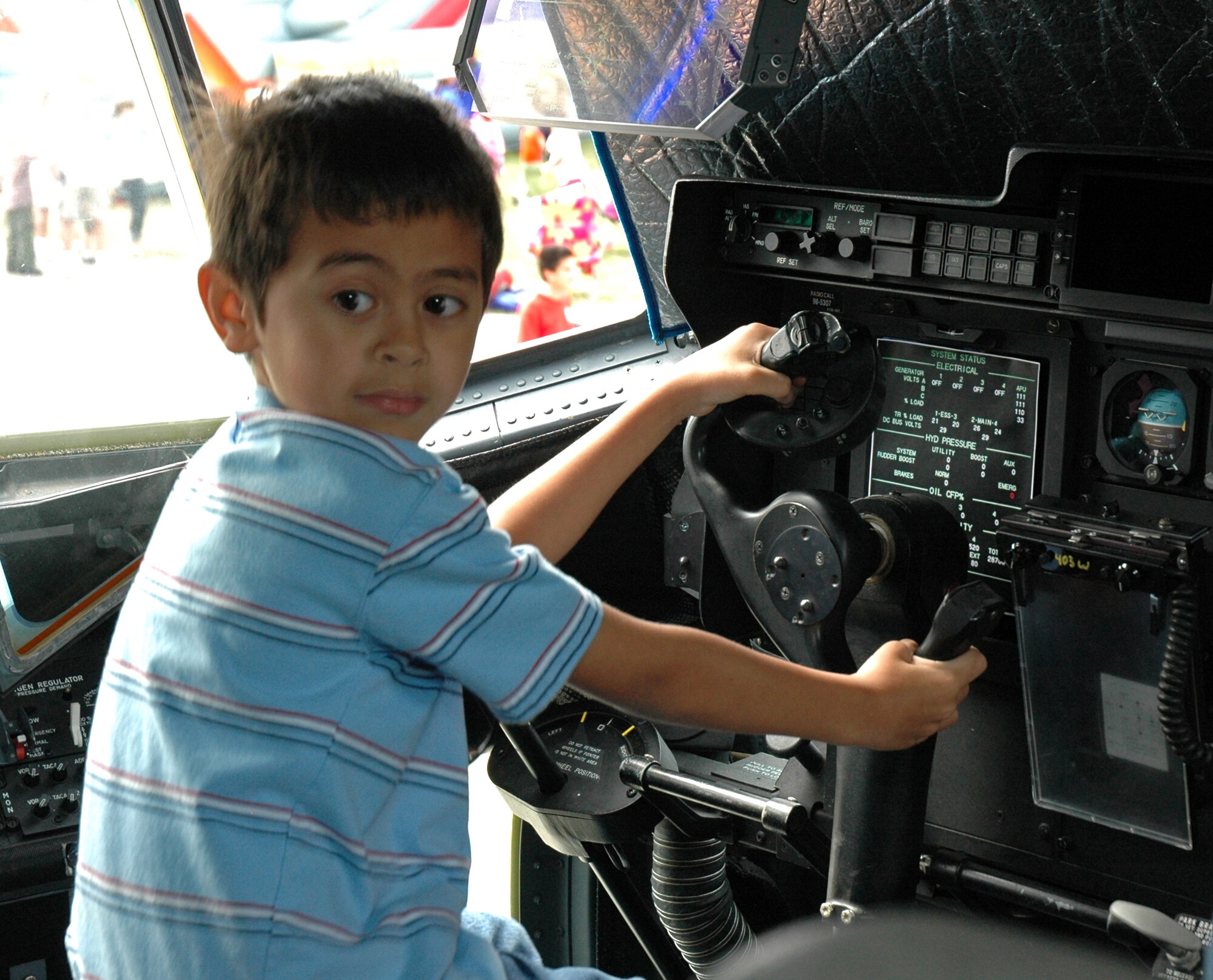 Let's take this baby for a spin! The 403rd Wing provided a hands-on experience to the many visitors at the 2009 Keesler Air Show, giving children of all ages a feel for what it is like to sit behind the wheel of the aircraft flown by the 53rd Weather Reconnaissance Squadron and the 815th Airlift Squadron.