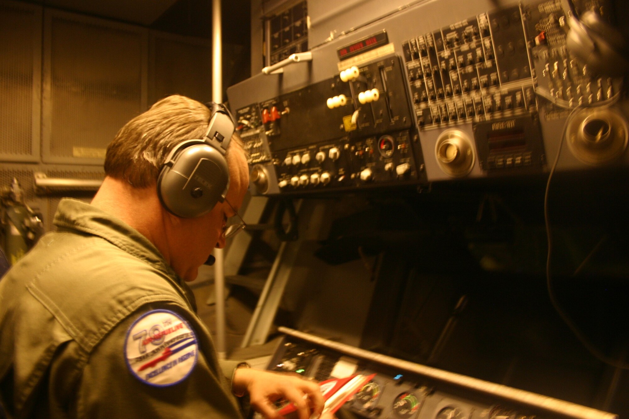 NELLIS AIR FORCE BASE, Nev. -- Air Force Master Sgt. Dave Kielhorn, boom operator, 79th Air Refueling Squadron, Travis Air Force Base, Calif. prepares to operate the boom inside of a KC-10 during an air refueling mission with an F-16 during GFW 09-05. In partnership with the Army’s National Training Center, the Air Force’s Green Flag West is improving joint integration and warfighting skills of fighter pilots and joint terminal attack controllers conducting close air support missions to support maneuver forces as they prepare for deployments to Iraq and Afghanistan.  (U.S. Air Force photo/Casey Bain)