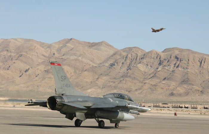 An F-16 Fighting Falcon from the 23rd Fighter Squadron, Spangdahlem Air Base, Germany begins its taxi to take-off during Green Flag West 09-05 at Nellis Air Force Base, Nev.  (Photo: Casey Bain, JFIIT, USJFCOM)