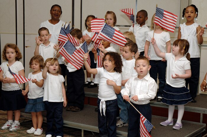 Children from the Brig. Gen. Thomas R.  Mikolajcik Child Development Center sing during the 2nd Annual Joint Community Proclamation Signing Ceremony at the Charleston Club April 2. The signing of the proclamation continues collaboration with local communities and military installations for prevention of sexual assault and child abuse. Representatives from six nearby communities, along with the Naval Weapons Station Charleston, joined Charleston AFB in signing the proclamation. (U.S. Air Force photo/Staff Sgt. Marie Cassetty)