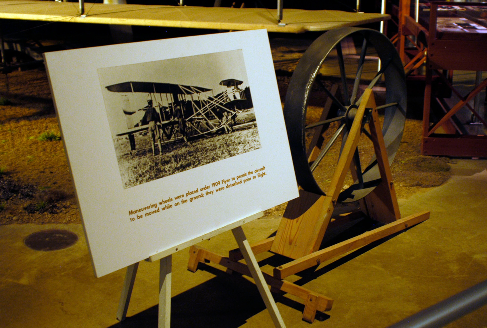 DAYTON, Ohio -- Maneuvering wheels on display near the Wright 1909 Military Flyer in the Early Years Gallery at the National Museum of the United States Air Force. Maneuvering wheels were placed under the 1909 Flyer to permit the aircraft to be moved while on the ground. They were detached prior to flight. (U.S. Air Force photo)