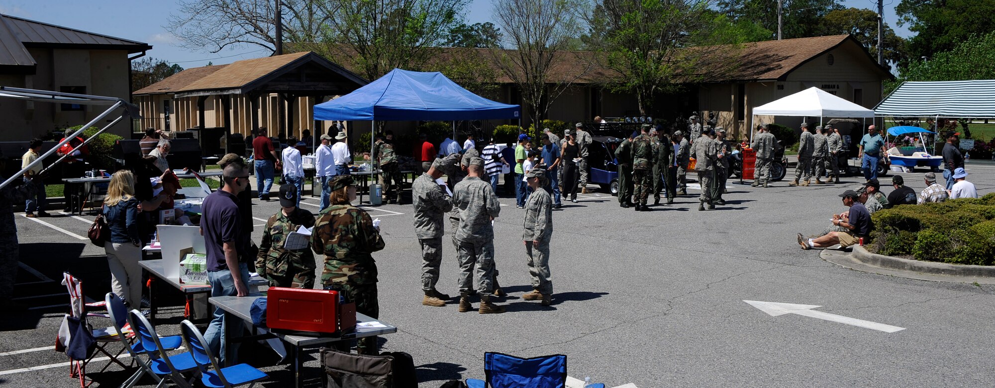 MOODY AIR FORCE BASE, Ga. -- Moody personnel walk around to see the different booths at the annual Outdoor Extravaganza here April 3. The event featured a free lunch, demonstrations from downtown vendors and displays showing the services Outdoor Adventure offers. (U.S. Air Force photo by Senior Airman Brittany Barker)