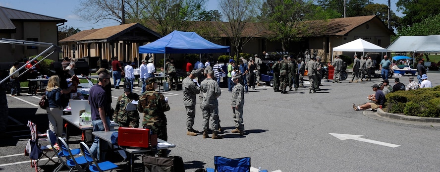 MOODY AIR FORCE BASE, Ga. -- Moody personnel walk around to see the different booths at the annual Outdoor Extravaganza here April 3. The event featured a free lunch, demonstrations from downtown vendors and displays showing the services Outdoor Adventure offers. (U.S. Air Force photo by Senior Airman Brittany Barker)