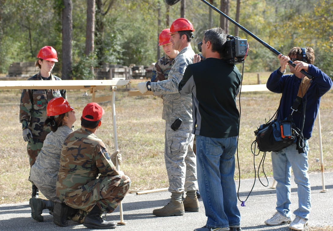 A film crew tapes members of the 202nd REDHORSE Squadron for an episode of DIY Network's "Cool Tools" show, Jan. 8, 2009.