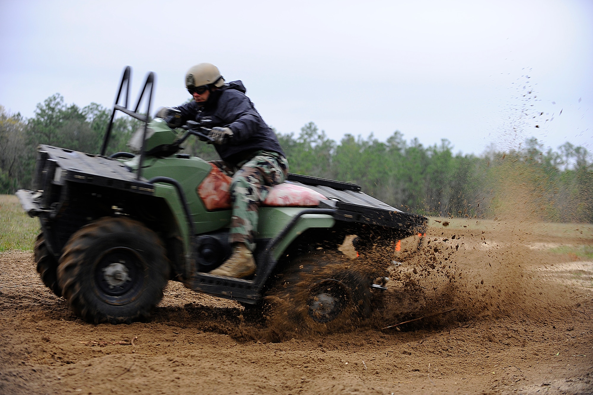 HURLBURT FIELD, Fla. -- A student from the 720th Special Tactics Training Squadron maneuvers through a rut during a beginner level dirt bike course here, March 31. (U.S. Air Force photo/ Senior Airman Julianne Showalter)(RELEASED)