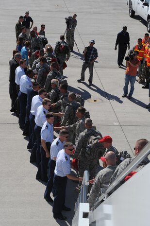 Nellis leadership greet more than 300 Airmen, from the 820th RED HORSE Squadron, upon their arrival home after a seven-month deployment in Southwest Asia , April 6, Nellis Air Force Base, Nev.The mission of the 820th RHS is to provide the Air Force with a highly -mobile civil engineering capability in support of contingency and special operations worldwide. (U.S. Air Force photo by Senior Airman Nadine Y. Barclay)  (RELEASED)