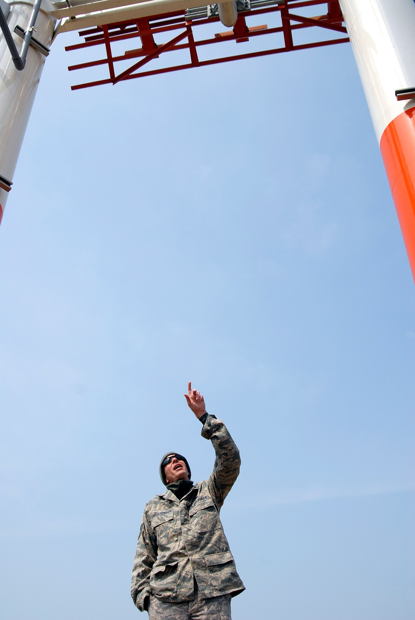 Technical Sgt. Eric Christensen, a member of the Pacific Air Forces Airfield Systems Special Maintenance team, conducts a ground level survey of the Runway 1-8 Glideslope antenna array April 4, 2009. Communications squadron Airmen installed the antennas at Kunsan Air Base, Republic of Korea, which will assist Wolf Pack pilots in landing at the base, even during inclement weather and low visibility. (U.S. Air Force Photo by SSgt Jason Colbert)

