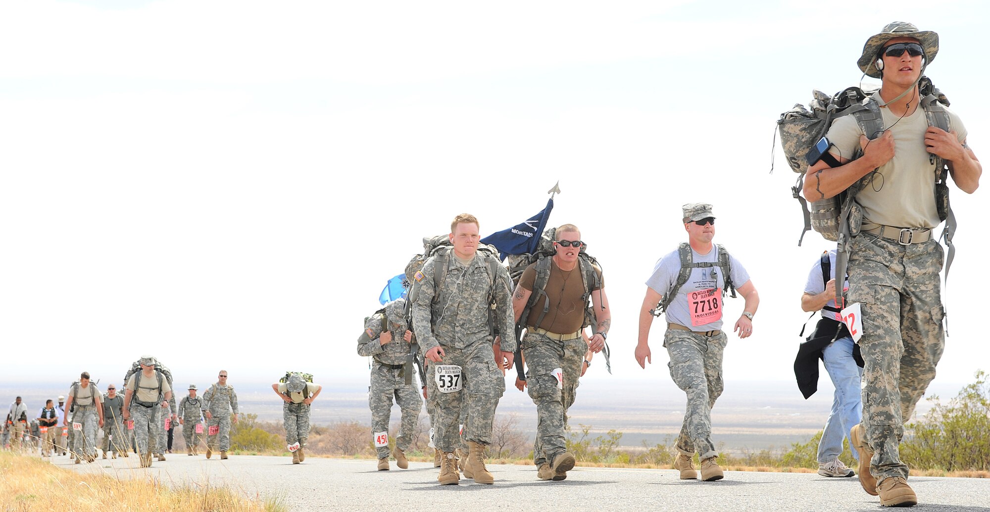 Participants from all over the world tread the rigourous 26-mile course at White Sands Missile Range, N.M., March 29, as part of the Bataan Death March. The  March honors a special group of World War II heroes who were responsible for the defense of the islands of Luzon, Corregidor and the harbor defense forts of the Philippines. (U.S. Air Photo/ Airman 1st Class DeAndre Curtiss)