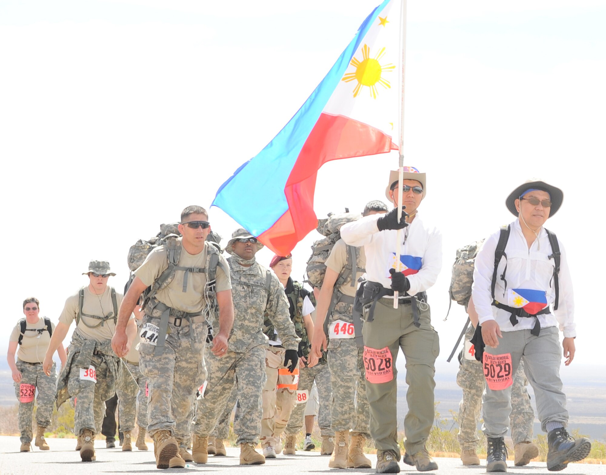 Participants from all over the world tread the rigourous 26-mile course at White Sands Missile Range, N.M., March 29, as part of the Bataan Death March. The  March honors a special group of World War II heroes who were responsible for the defense of the islands of Luzon, Corregidor and the harbor defense forts of the Philippines. (U.S. Air Photo/ Airman 1st Class DeAndre Curtiss)