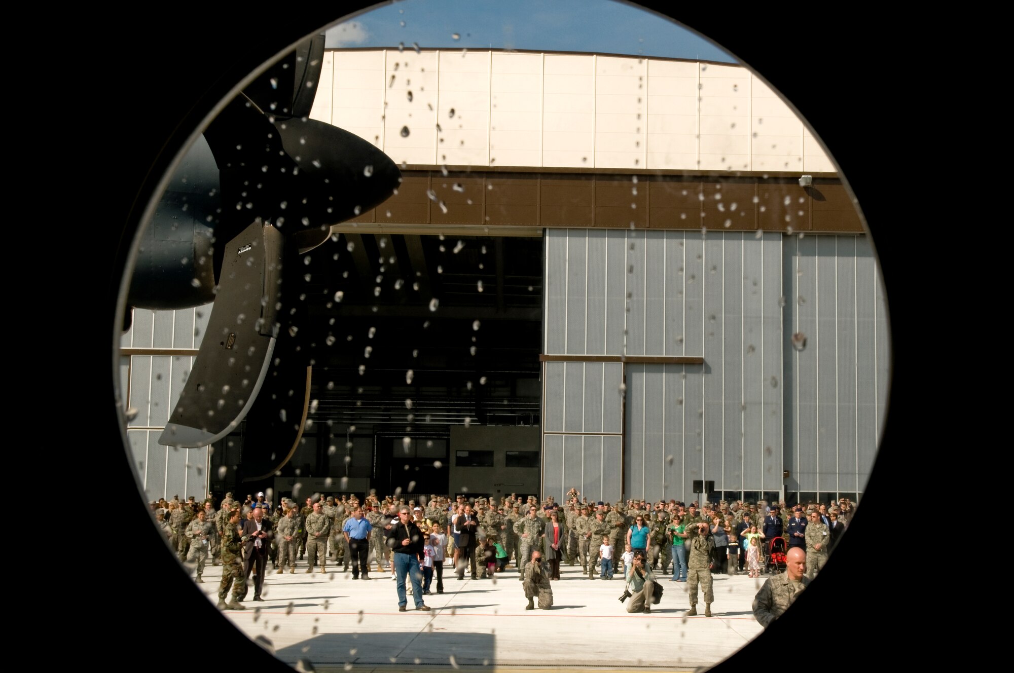 A C-130J lands on Ramstein Air Base for the first time during a ceremony April 7 held to not only honor the arrival of the new aircraft, but also a new era in operations for the 86th Airlift Wing. The ceremony also included a ribbon cutting for a new 68,000 square feet dual-bay maintenance hangar, which can hold two C-130J aircraft or one C-17. (U.S. Air Force photo by Senior Airman Nathan Lipscomb)