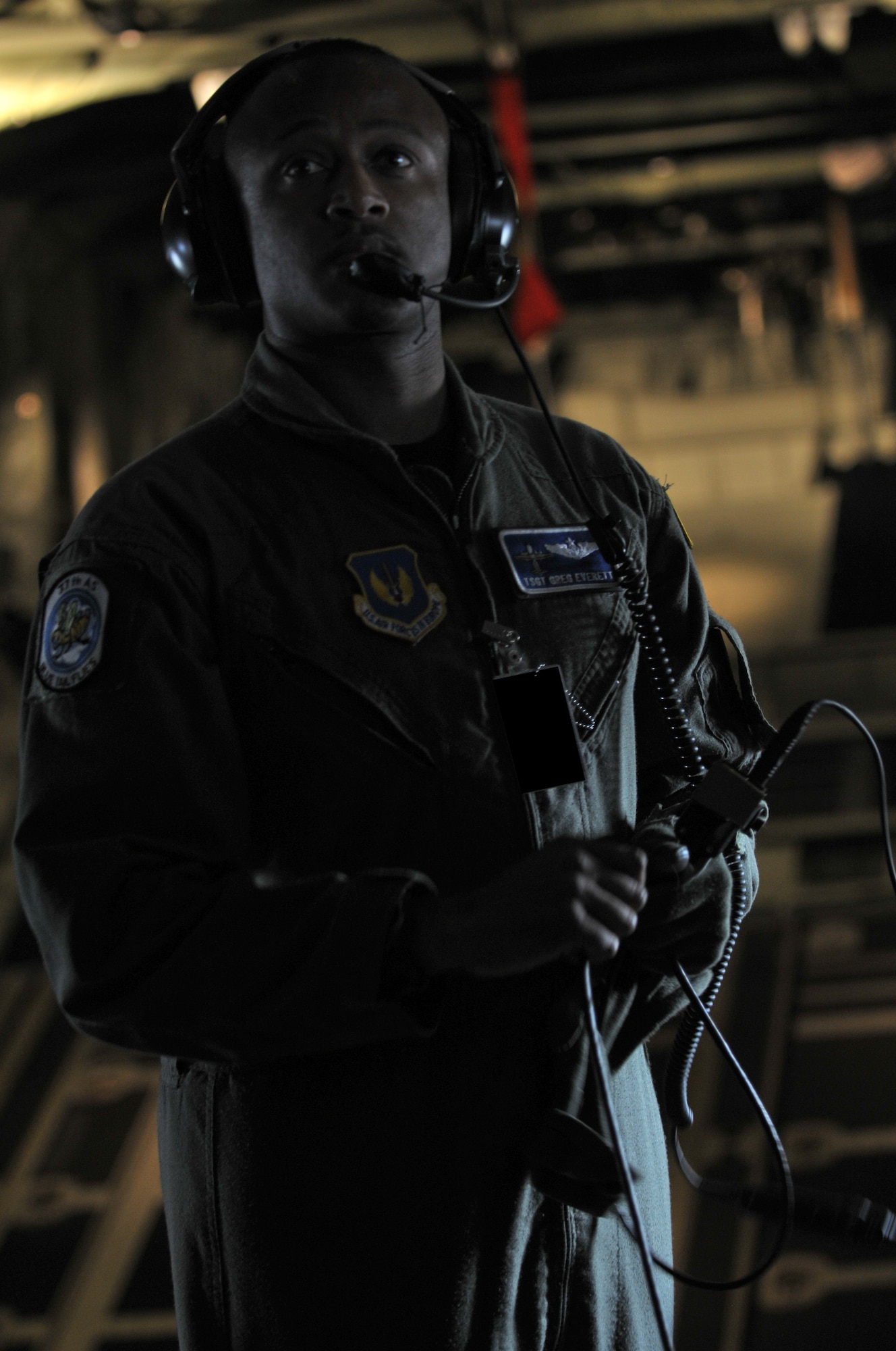 Tech. Sgt. Greg Everett, 86th Airlift Wing loadmaster, prepares for take-off in the first C-130J to hit Ramstein Air Base April 7. The C-130J provides approximately 20 percent improvements over previous C-130 models in speed, fuel efficiency, cargo capacity and altitude capabilities.  (U.S. Air Force photo by Senior Airman Nathan Lipscomb)