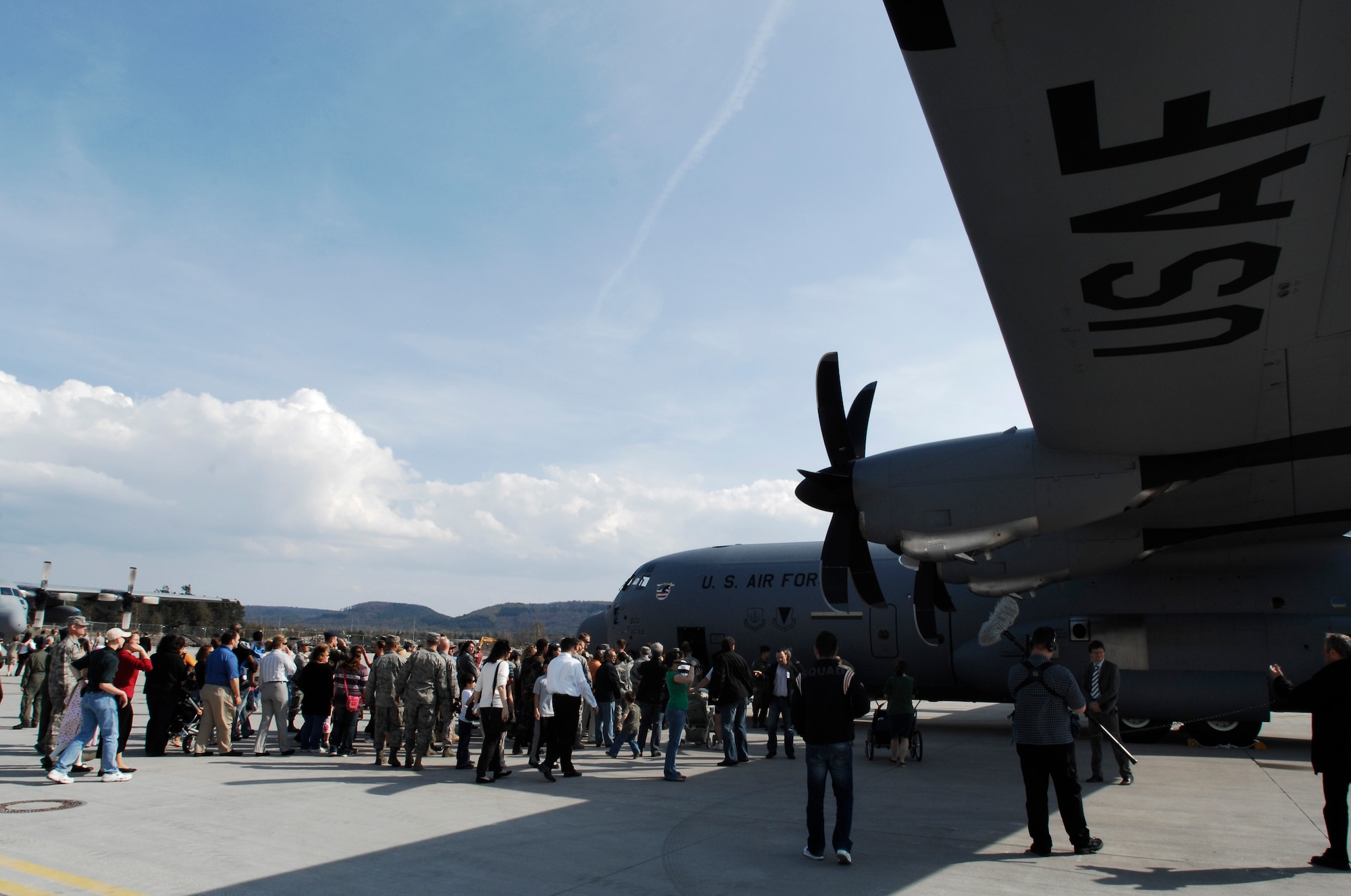 Airmen and their families tour the 86th Airlift Wing's new C-130J aircraft, April 7, 2009, Ramstein Air Base, Germany. The C-130J landed on Ramstein for the first time during a ceremony held to not only honor the arrival of the new aircraft, but also a new era in operations for the 86th Airlift Wing. (U.S. Air Force photo by Senior Airman Amber Bressler)
