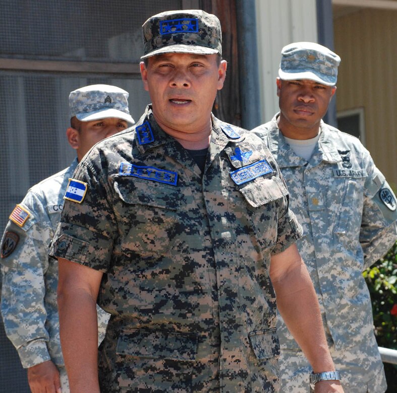 SOTO CANO AIR BASE, Honduras - Honduran Air Force Comander Col. Wilfredo Reyes addresses a class of 30 graduating Airmen and cadetes here as they complete the Combat Lifesaver Course April 3. During the weeklong course, students learned self-aid and buddy care, how to administer intravenous fluids, and medical evacuation.  It was the first time the course was offered to the cadets.   (U.S. Air Force photo/Tech. Sgt. Rebecca Danét)