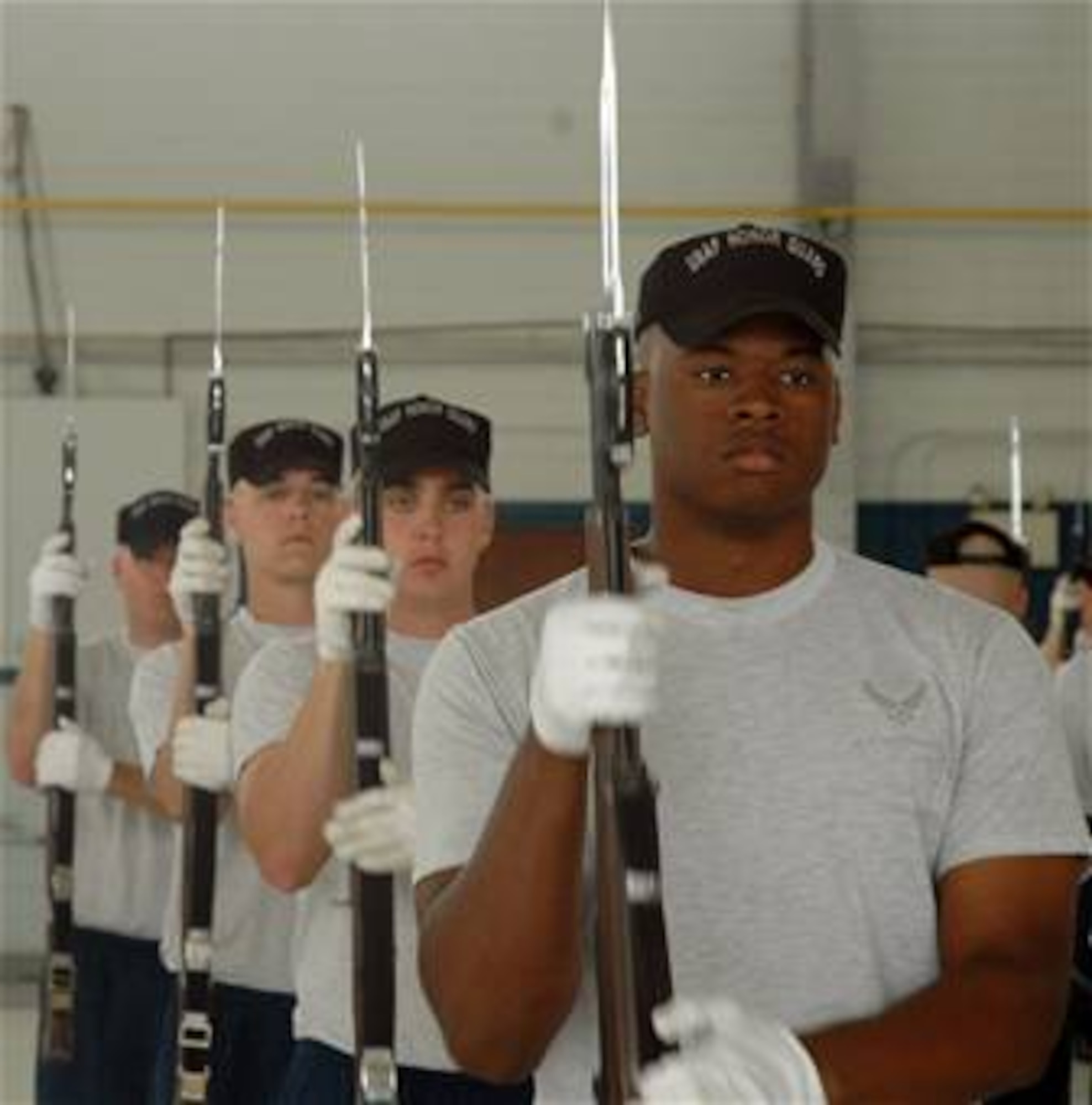 The Air Force Honor Guard drill team practices their newest routine March 30 during annual training held at Maxwell Air Force Base, Ala. The traveling component of the Air Force Honor Guard, the drill team serves as Air Force ambassadors to recruit, retain and inspire Airmen around the globe. (U.S. Air Force photo/Senior Airman R. Michael Longoria) 

