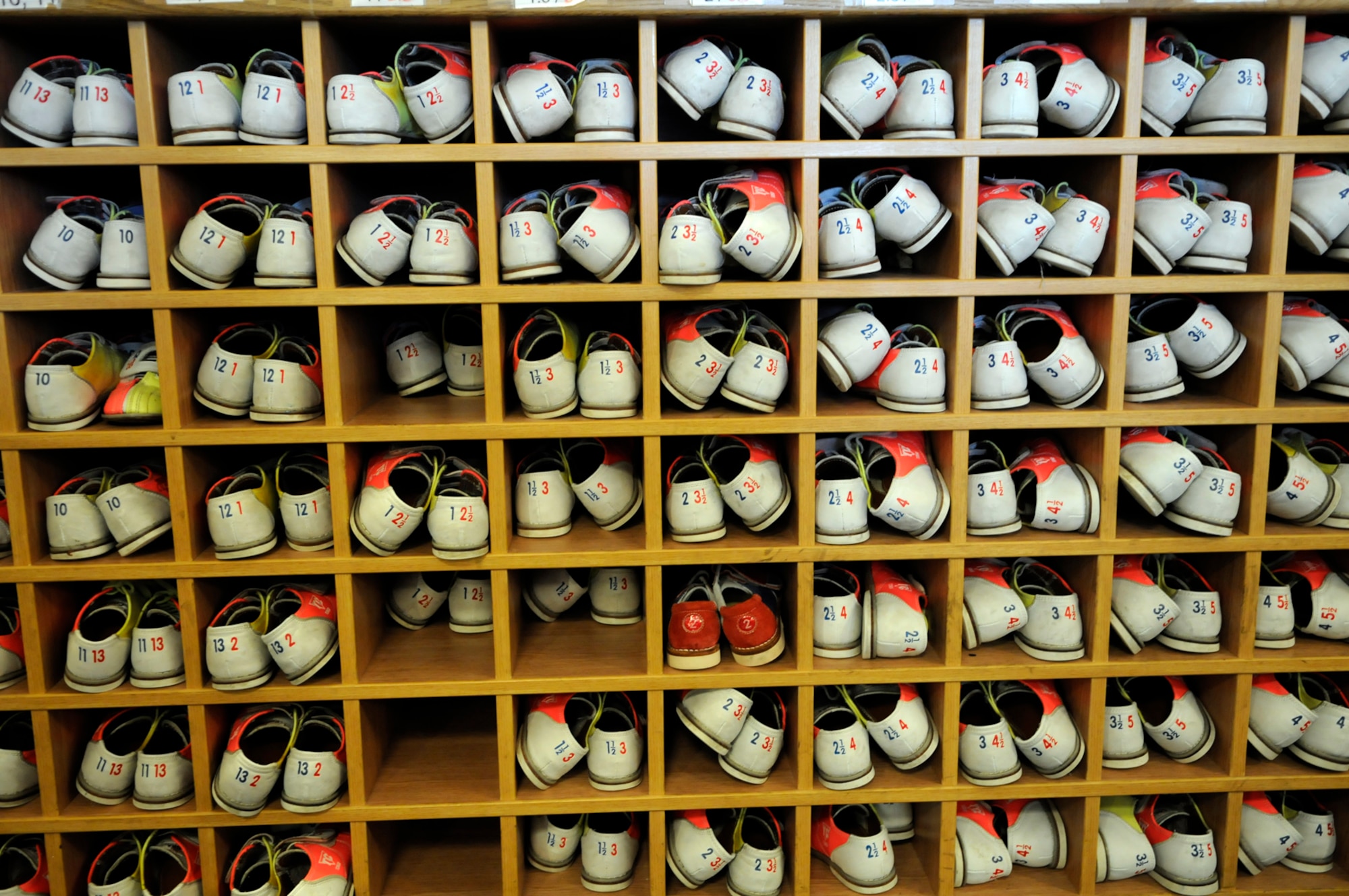 Different sized bowling shoes wait to be used by different sized bowlers at the RAF Mildenhall bowling center April 3.  The bowling center was named the best in the Air Force in a recent competition.  (U.S. Air Force photo by Senior Airman Christopher L. Ingersoll)