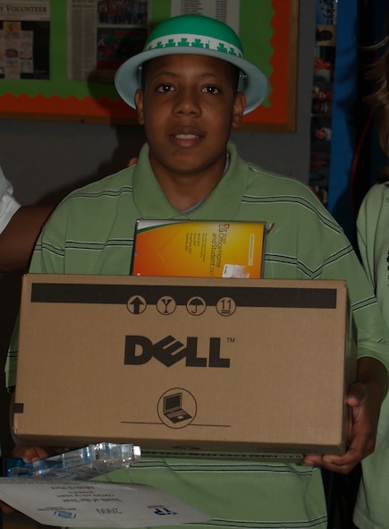 MOODY AIR FORCE BASE, Ga. --  Alfrederik Ward, son of Jackie Hargrave, Airman and Family Readiness Center child and youth program assistant, was recently named Youth of the Year. He recieved a new laptop and computer software for his achievement. (Courtesy photo)