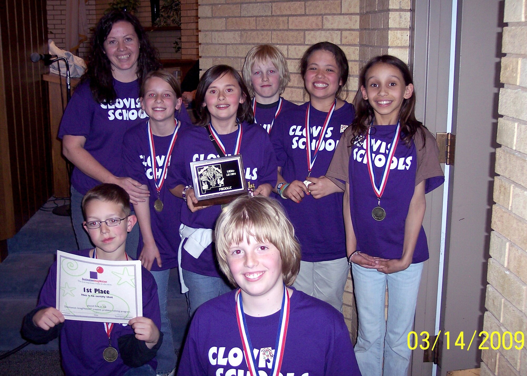 CANNON AIR FORCE BASE, N.M. -- Following their first-place finish in Destination ImagiNation tournament in Albuquerque, N.M. on March 14, Ranchvale Elementary fifth and sixth graders will compete in the finals in Knoxville, Tenn., in May.  Destination ImagiNation is a community-based, non-profit organization that teaches young people critical thinking skills needed for the 21st Century. The winning team members pictured above include (back row, left to right) teacher Carol Littlejohn, Katie Sartz, Abby Bugg, Mitchell Boddy, Corrie Domingo, Rosalia O'Brien. Front row team members are Nicholas Lenfant and Caleb Sapp. Five of the seven students are children of military families. (Courtesy photo) 