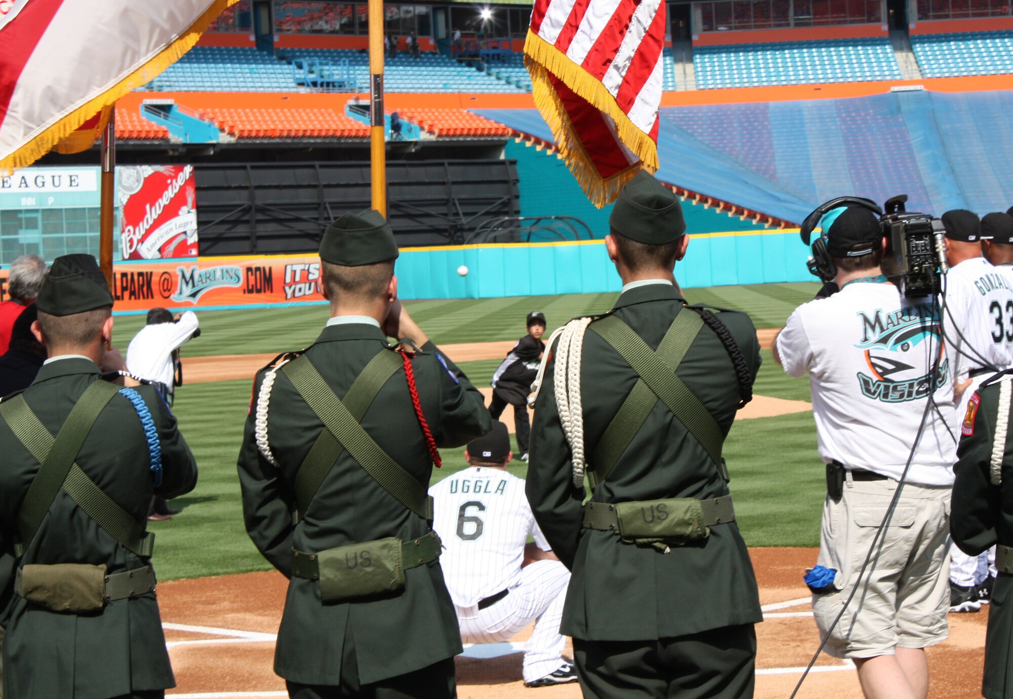 Sean Romero throws a strike to Dan Uggla for the first pitch of the Florida Marlins 2009 season in front of 33,000 fans at Dolphin Stadium on April 6. Sean Romero’s father, Senior Master Sgt. Tony Romero is the life support NCO-in-charge from the 93rd Fighter Squadron and is currently deployed to Joint Base Balad, Iraq. Sergeant Romero was filmed giving a “shout-out” to Marlins fans and asking Sean to help him out with the opening pitch for the Marlins’ pre-game tribute to the military (U.S. Air Force photo/2nd Lt. Erik Hofmeyer)