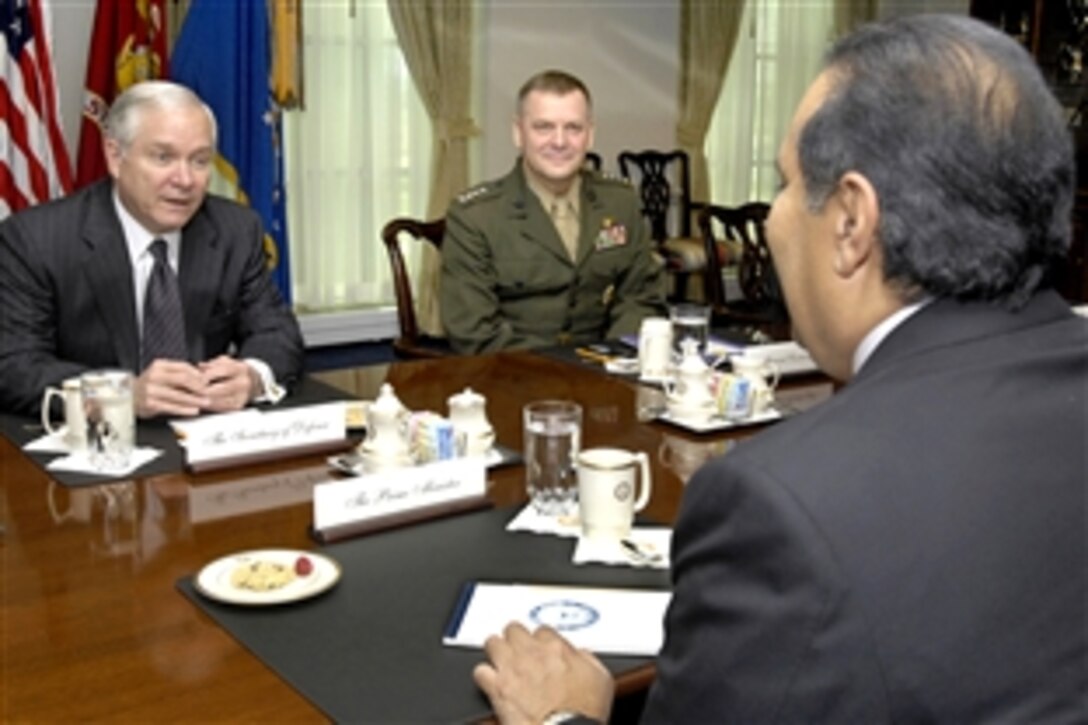 Defense Secretary Robert M. Gates, left, hosts a meeting with visiting Prime Minister Hamid bin Jassim Al-Thani, foreground, of Qatar, at the Pentagon, April 7, 2009. Marine Corps Gen. James E. Cartwright, center, vice chairman of the Joint Chiefs of Staff, also attended the meeting.