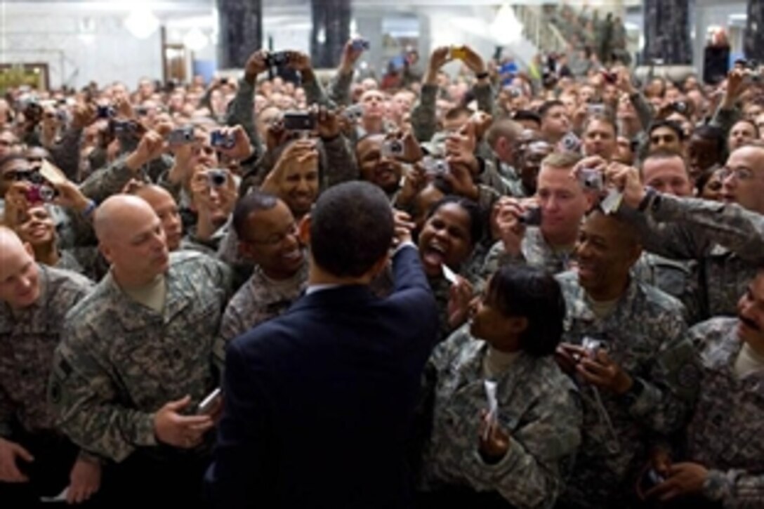 President Barack Obama shakes hands with hundreds of U.S. troops during his April 7, 2009, visit to Camp Victory, Iraq. "You have performed brilliantly in every mission that has been given to you. You’ve kept your eyes focused on just doing your job,” Obama told the troops.