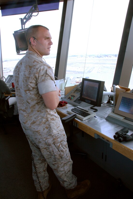 Staff Sgt. Joshua Hooten, air traffic controller, monitors the skies from the ATC tower at the Marine Corps Air Station in Yuma, Ariz., April 8, 2009. By the end of the summer, station air traffic controllers like Hooten, will manage not only Yuma airspace, but also that of Twentynine Palms, Calif. The air station is also slated to take control of airspace for Naval Air Facility El Centro, Calif., as part of a radar regionalization program.